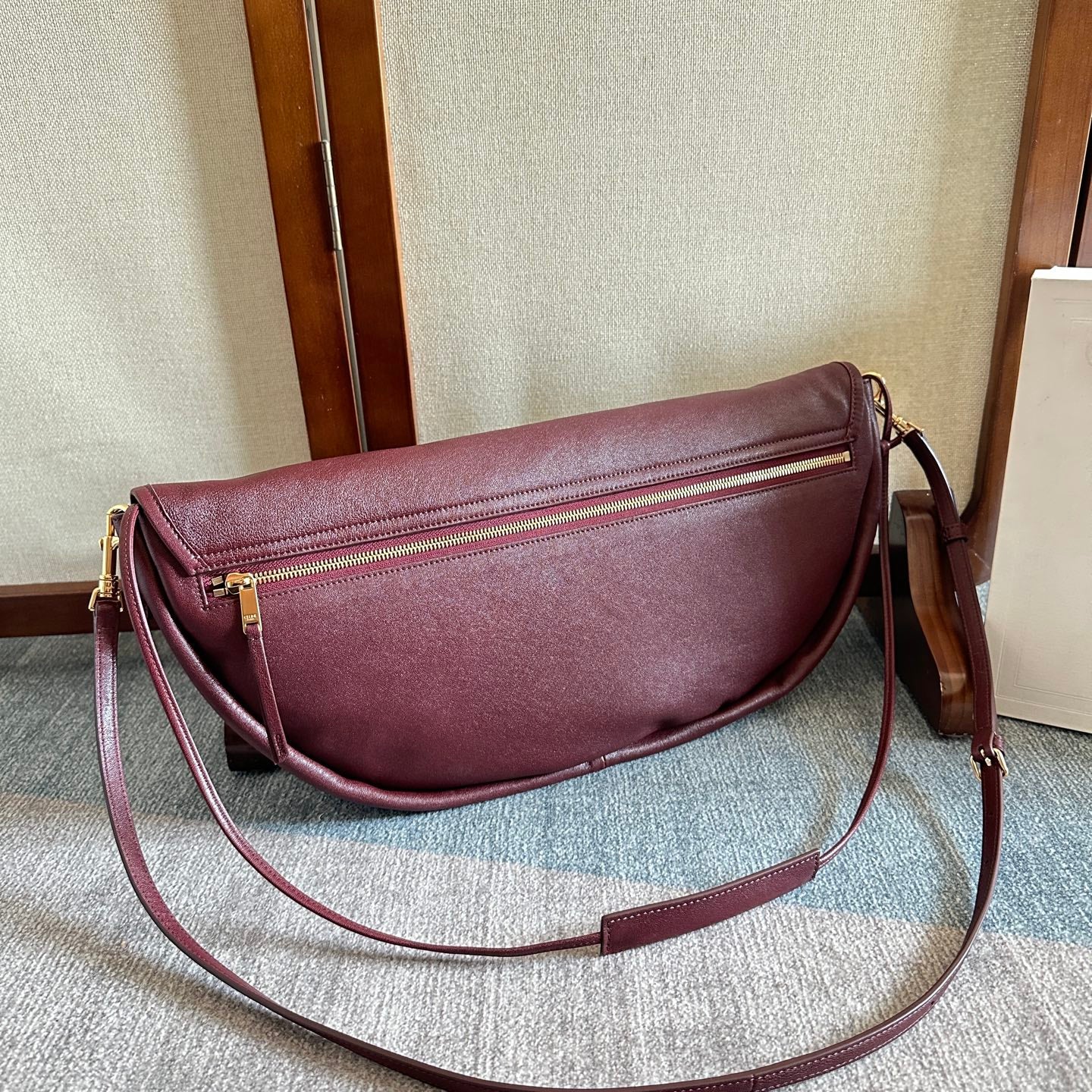 CELINE 25S HALFMOON SOFT TRIOMPHE BAG 46MM IN SYRAH RED SUPPLE SHINY LAMBSKIN