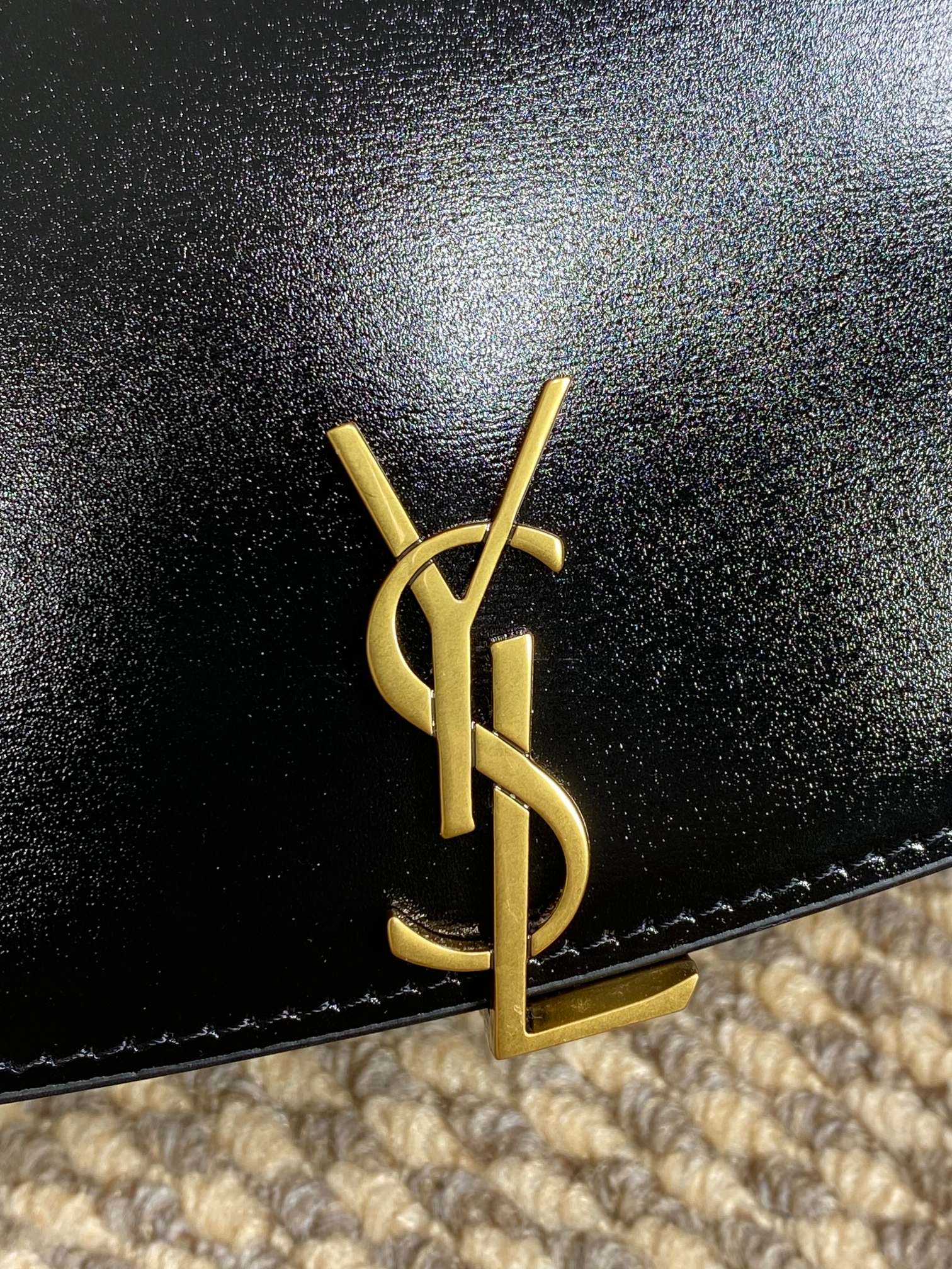 VOLTAIRE HALF-MOON SHOULDER BAG 24 IN BLACK CALFSKIN GOLD METALLIC